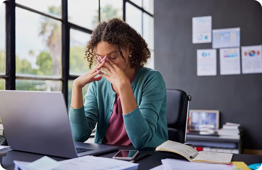 ContentCreator-Challenges Stressed woman at laptop
